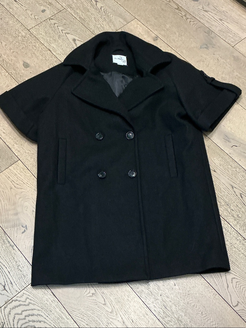 Woman’s Sam Edelman black short sleeve coat. Small. Pockets. Like new! So cute!